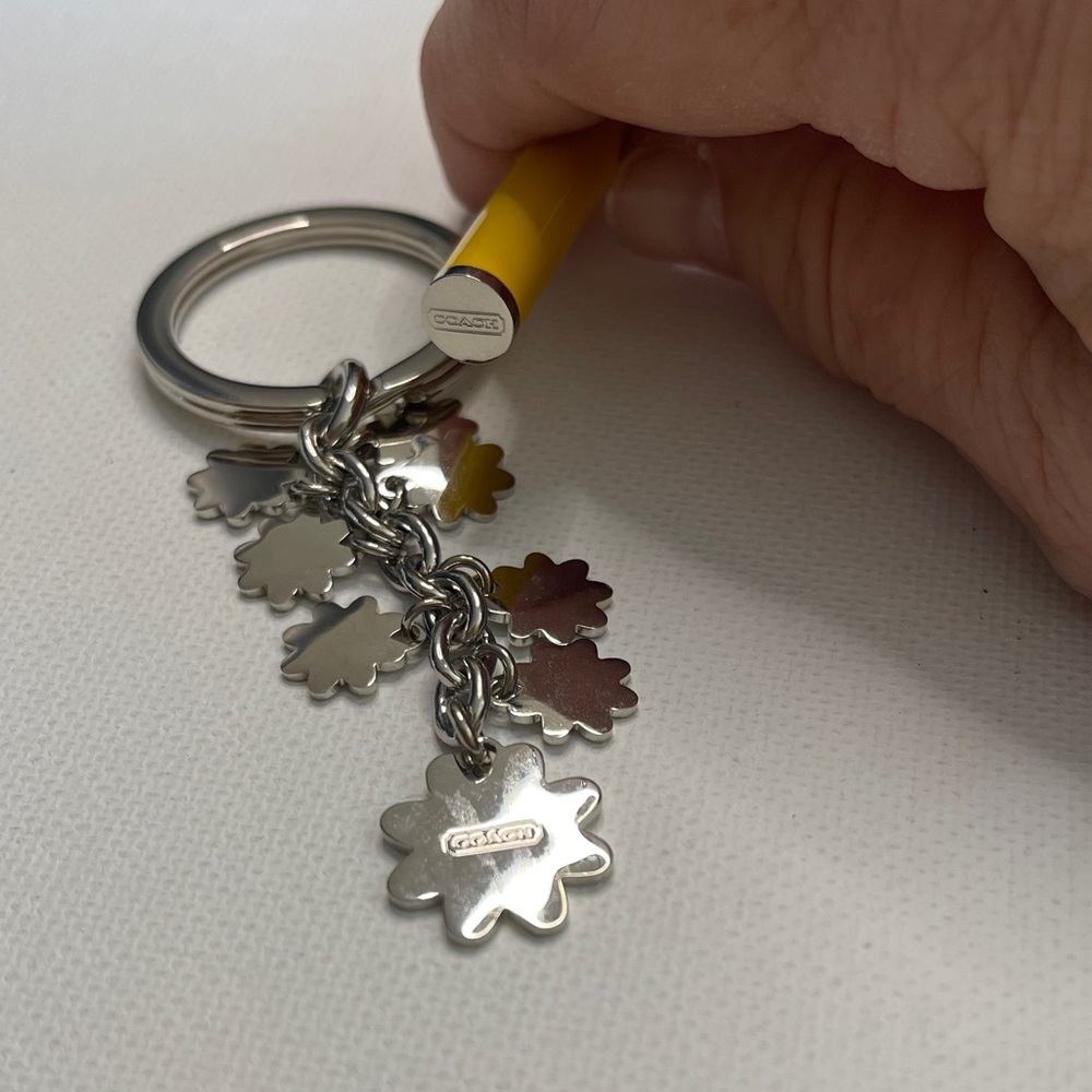 Coach Silver Daisy Keychain with Yellow Accents and Coach Pen - Picture 4 of 5